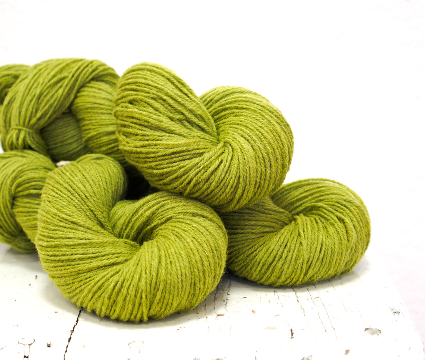 Lime green 60% wool and PO blend yarn, 100g/3,5oz.