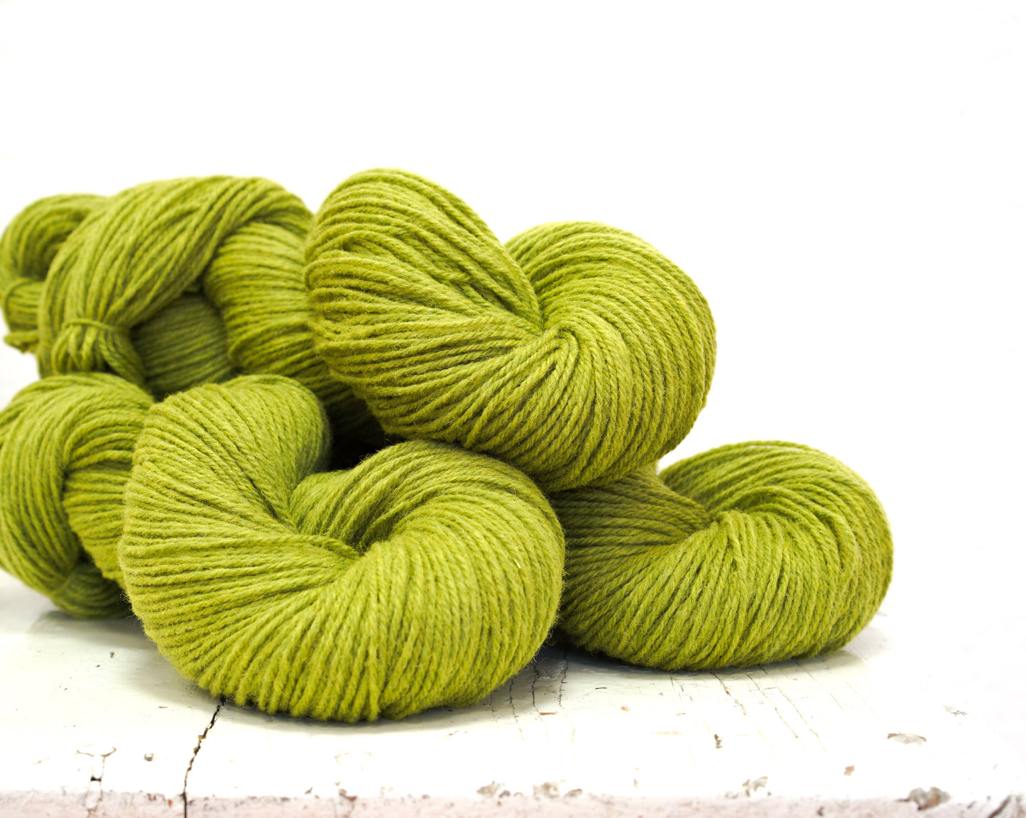 Lime green 60% wool and PO blend yarn, 100g/3,5oz.