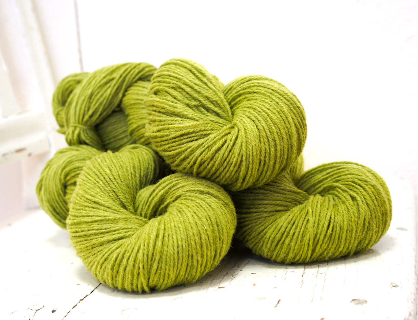 Lime green 60% wool and PO blend yarn, 100g/3,5oz.