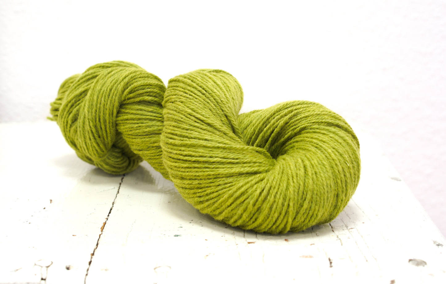Lime green 60% wool and PO blend yarn, 100g/3,5oz.