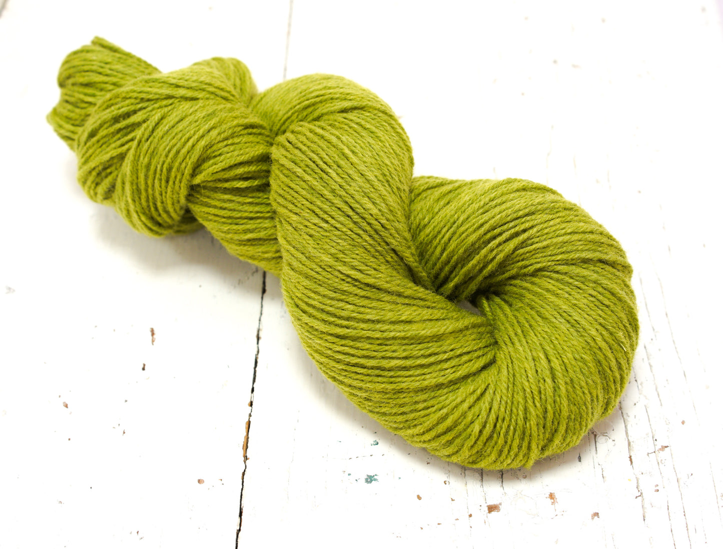 Lime green 60% wool and PO blend yarn, 100g/3,5oz.