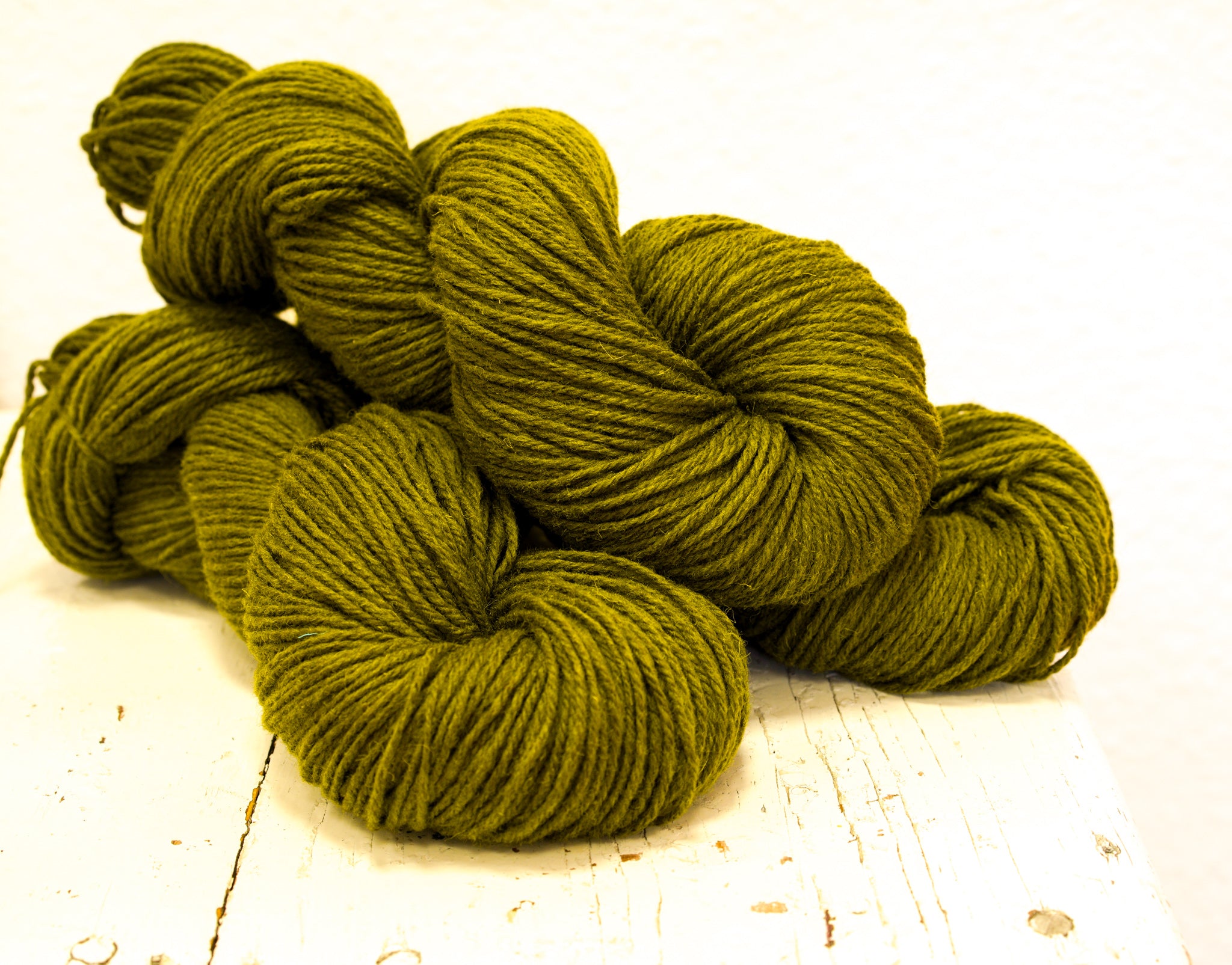 Moss green 60% wool and PO blend yarn, 100g/3,5oz.