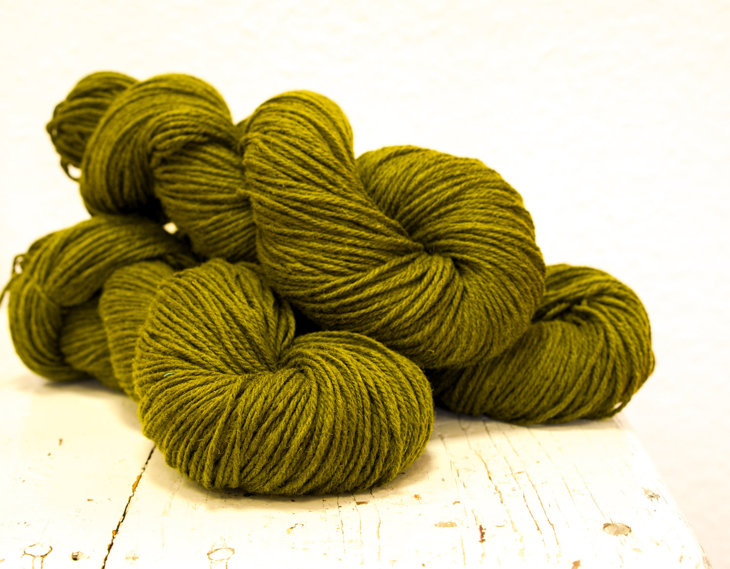 Moss green 60% wool and PO blend yarn, 100g/3,5oz.