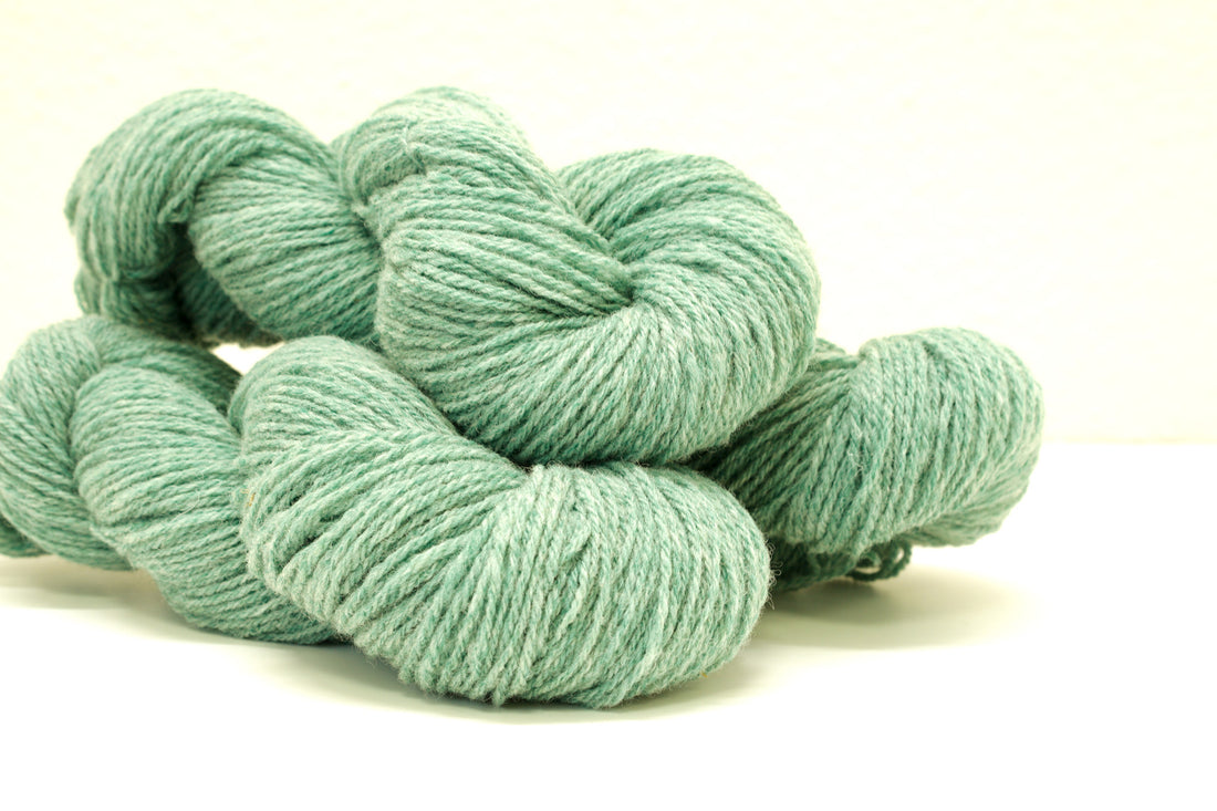 Green melange color Merino and Suffolk wool yarn blend