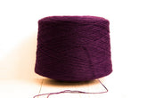 Raisin color wool yarn cone | raisin-color-wool-yarn-cone