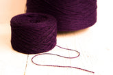 Raisin color wool yarn cone | raisin-color-wool-yarn-cone
