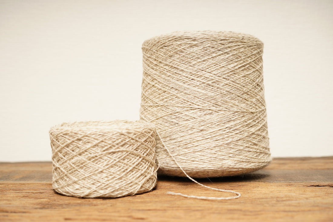 Sand-white melange wool in cone | sand-white-melange-wool-in-cone