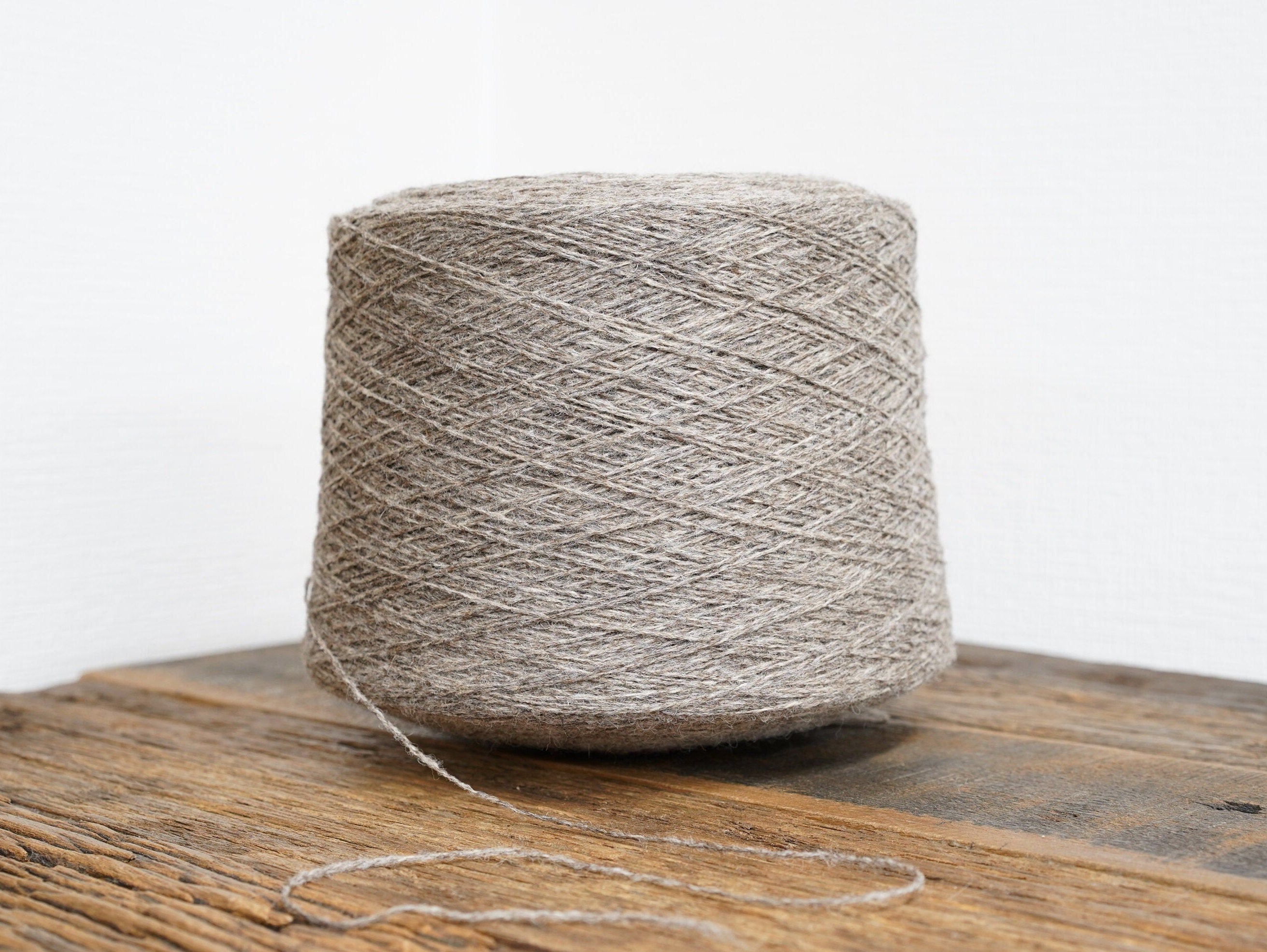 Grey-brown natural wool yarn in cone | grey-brown-natural-wool-yarn-in-cone