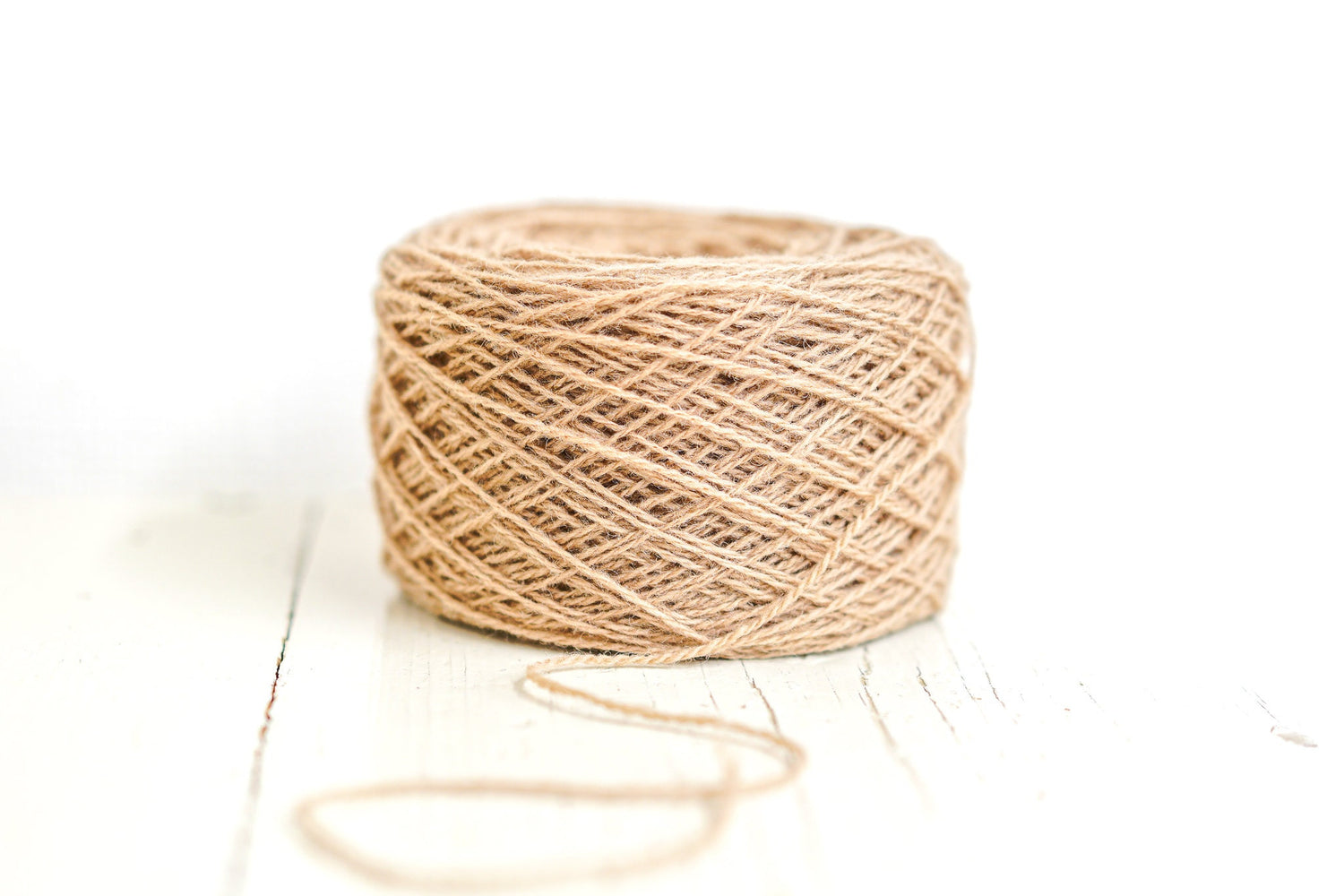 Light-brown wool yarn in cone | light-brown-wool-yarn-in-cone
