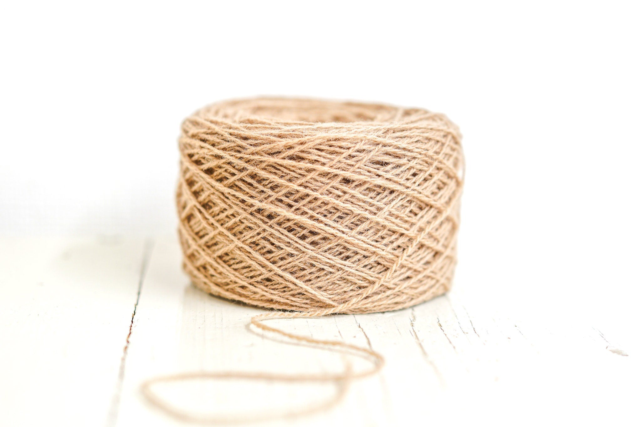 Light-brown wool yarn in cone | light-brown-wool-yarn-in-cone