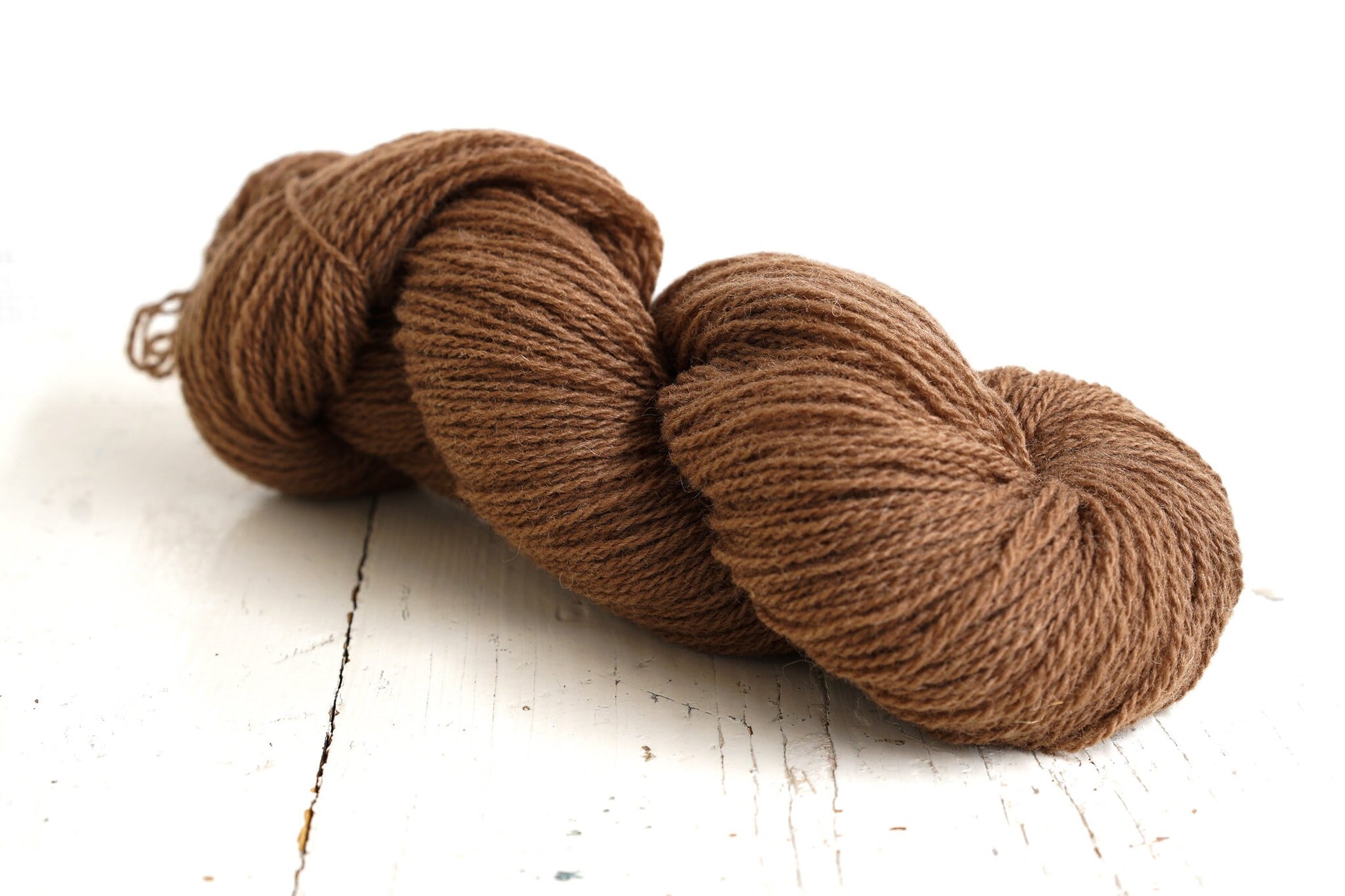Brown and green shades of wool yarn