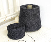 Dark grey fingering wool yarn in cones | dark-grey-fingering-wool-yarn-in-cones