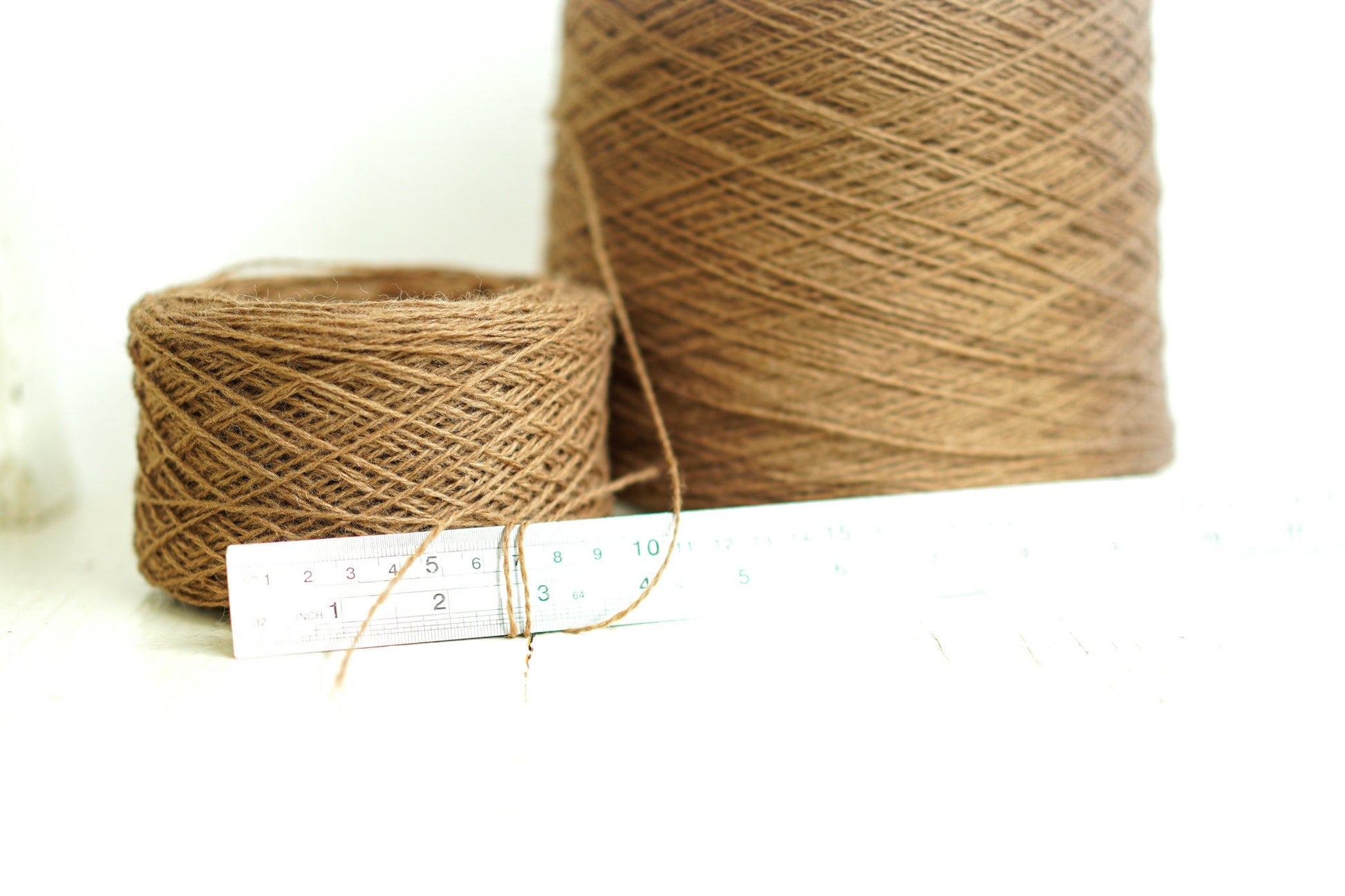 Sand brown wool yarn in cone | sand-brown-wool-yarn-in-cone