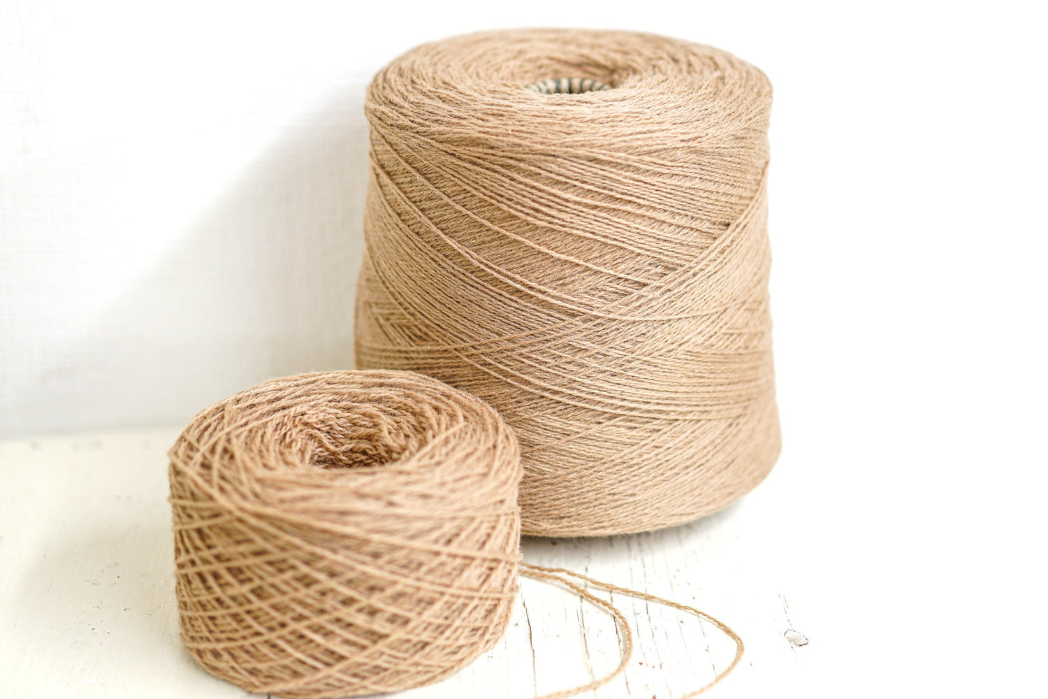Light-brown wool yarn in cone | light-brown-wool-yarn-in-cone