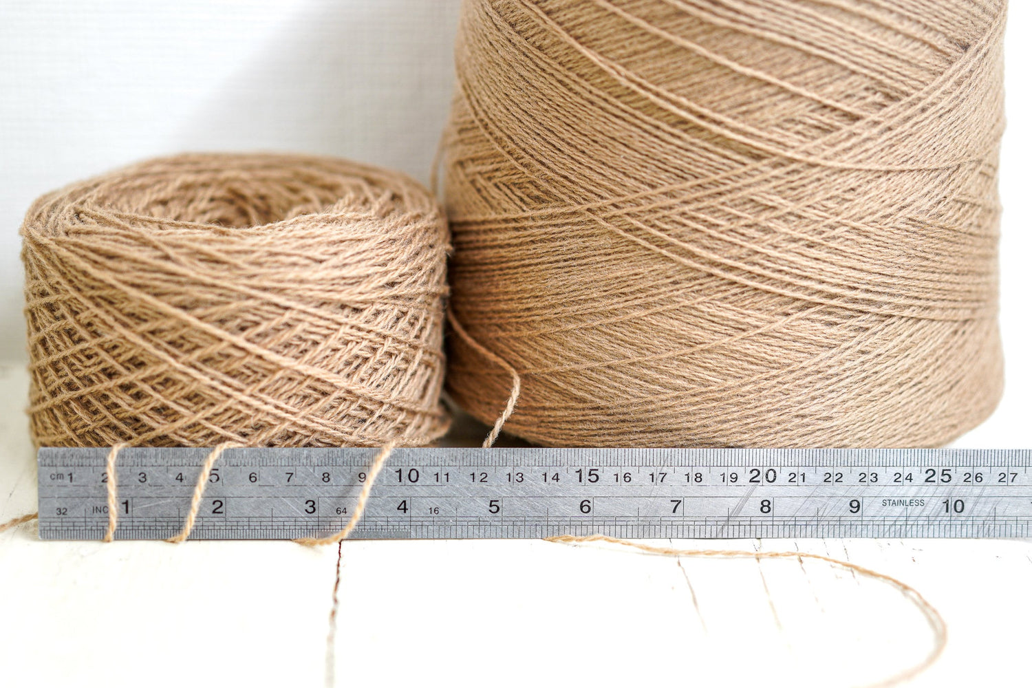 Light-brown wool yarn in cone | light-brown-wool-yarn-in-cone