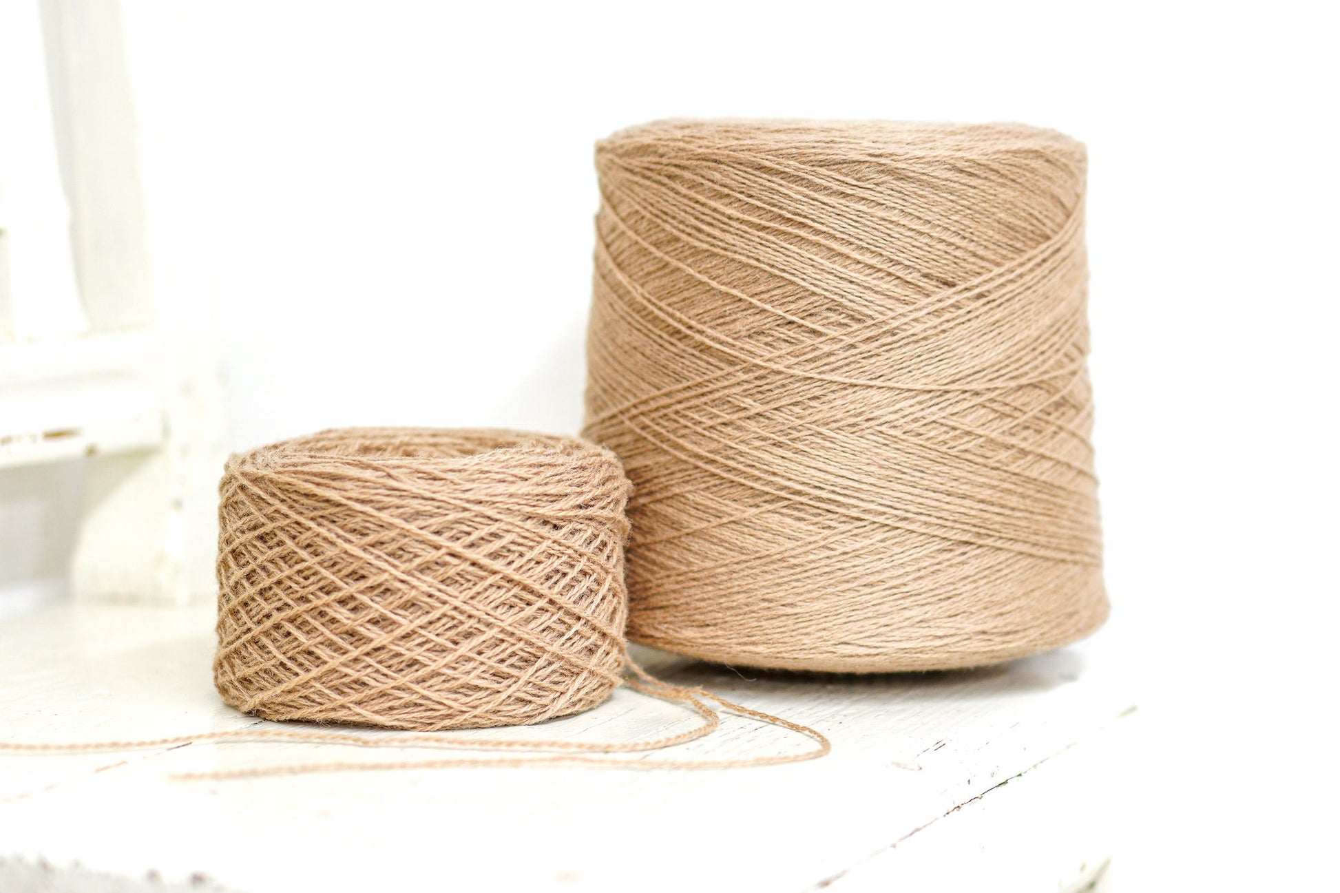 Light-brown wool yarn in cone
