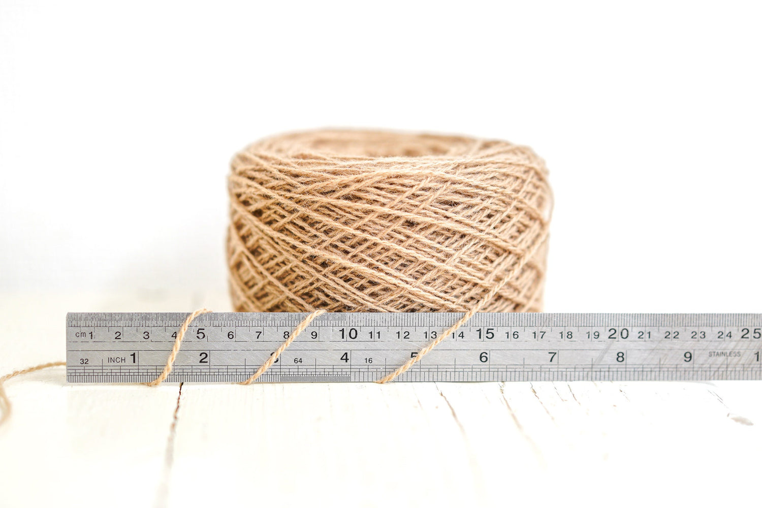 Light-brown wool yarn in cone | light-brown-wool-yarn-in-cone