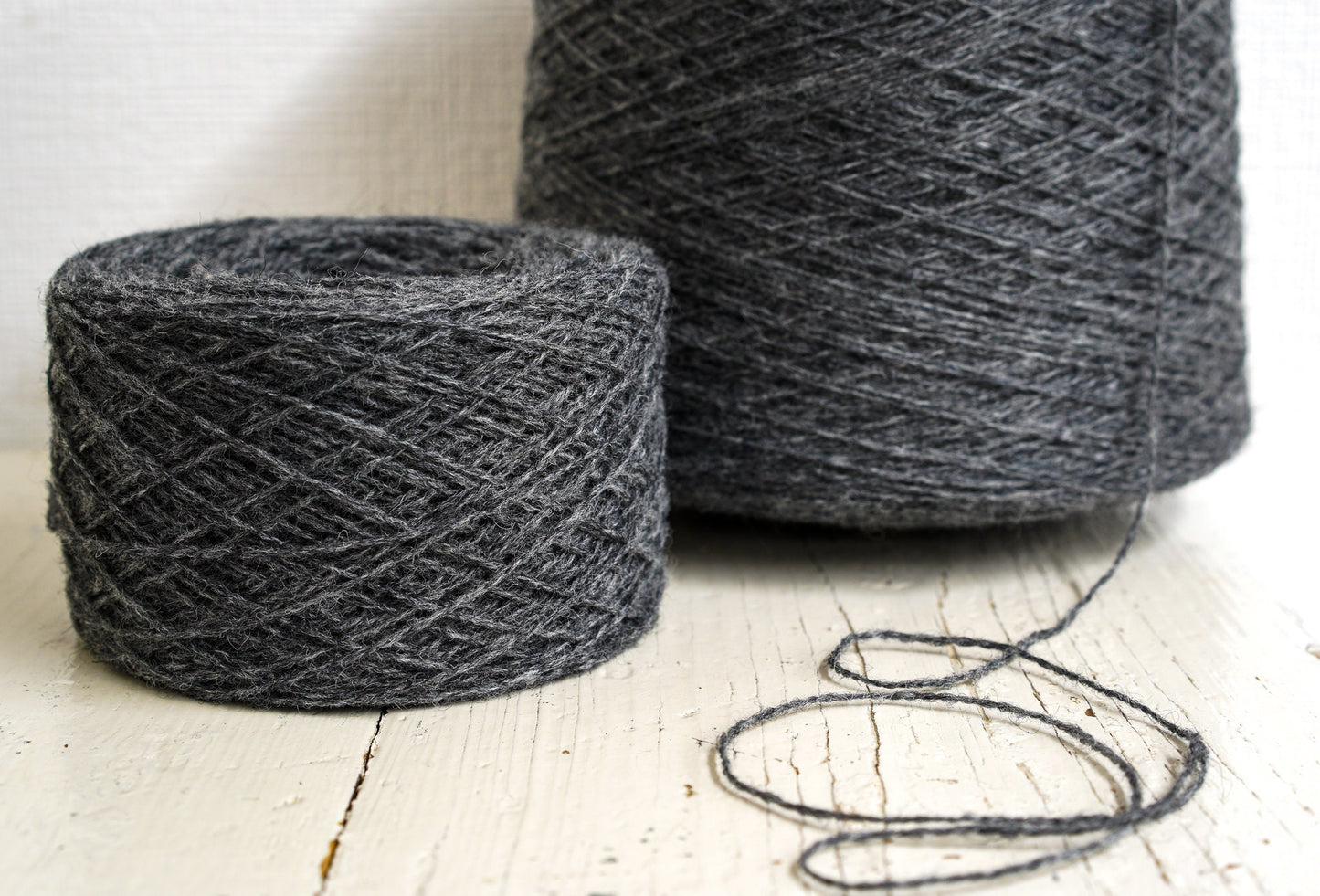 Graphite grey fingering wool yarn in cones | graphite-grey-fingering-wool-yarn-in-cones-1