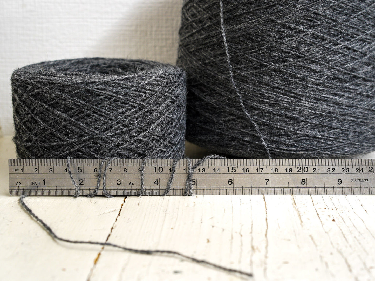 Graphite grey fingering wool yarn in cones | graphite-grey-fingering-wool-yarn-in-cones-1