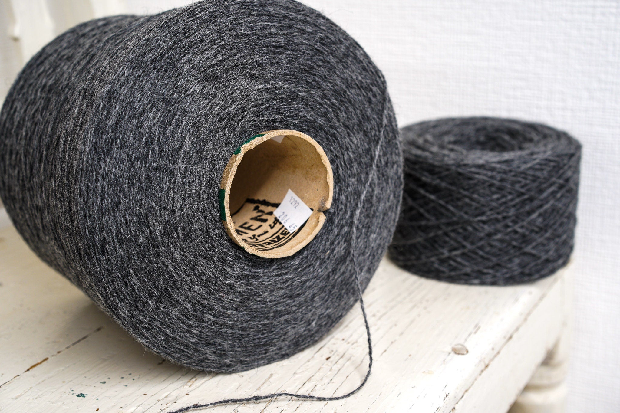 Graphite grey fingering wool yarn in cones | graphite-grey-fingering-wool-yarn-in-cones-1