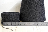 Dark grey fingering wool yarn in cones | dark-grey-fingering-wool-yarn-in-cones