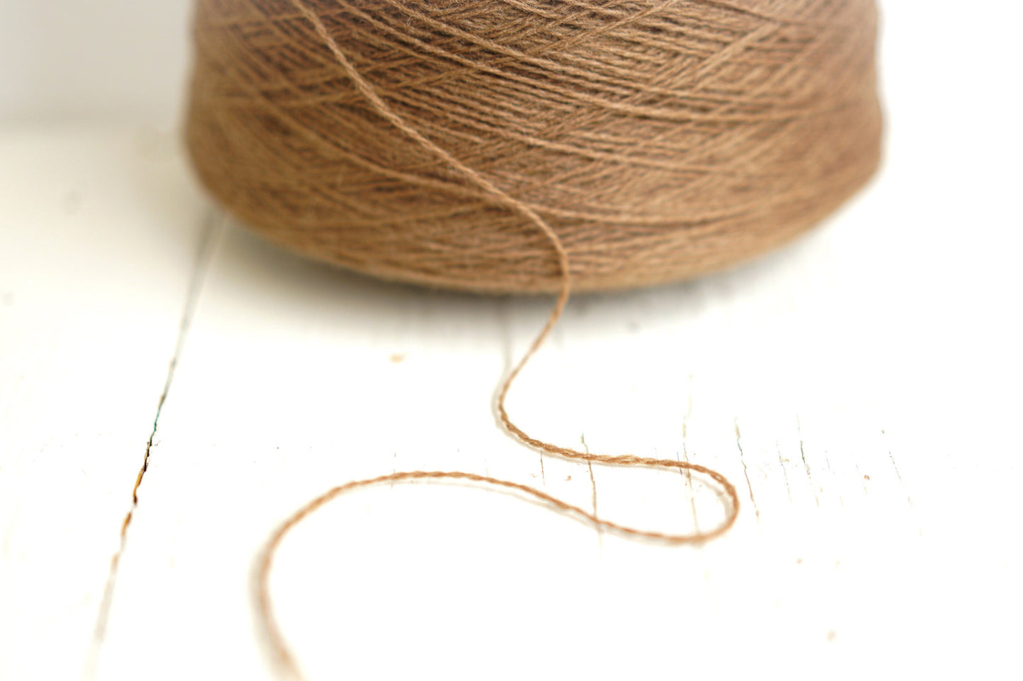 Sand brown wool yarn in cone | sand-brown-wool-yarn-in-cone