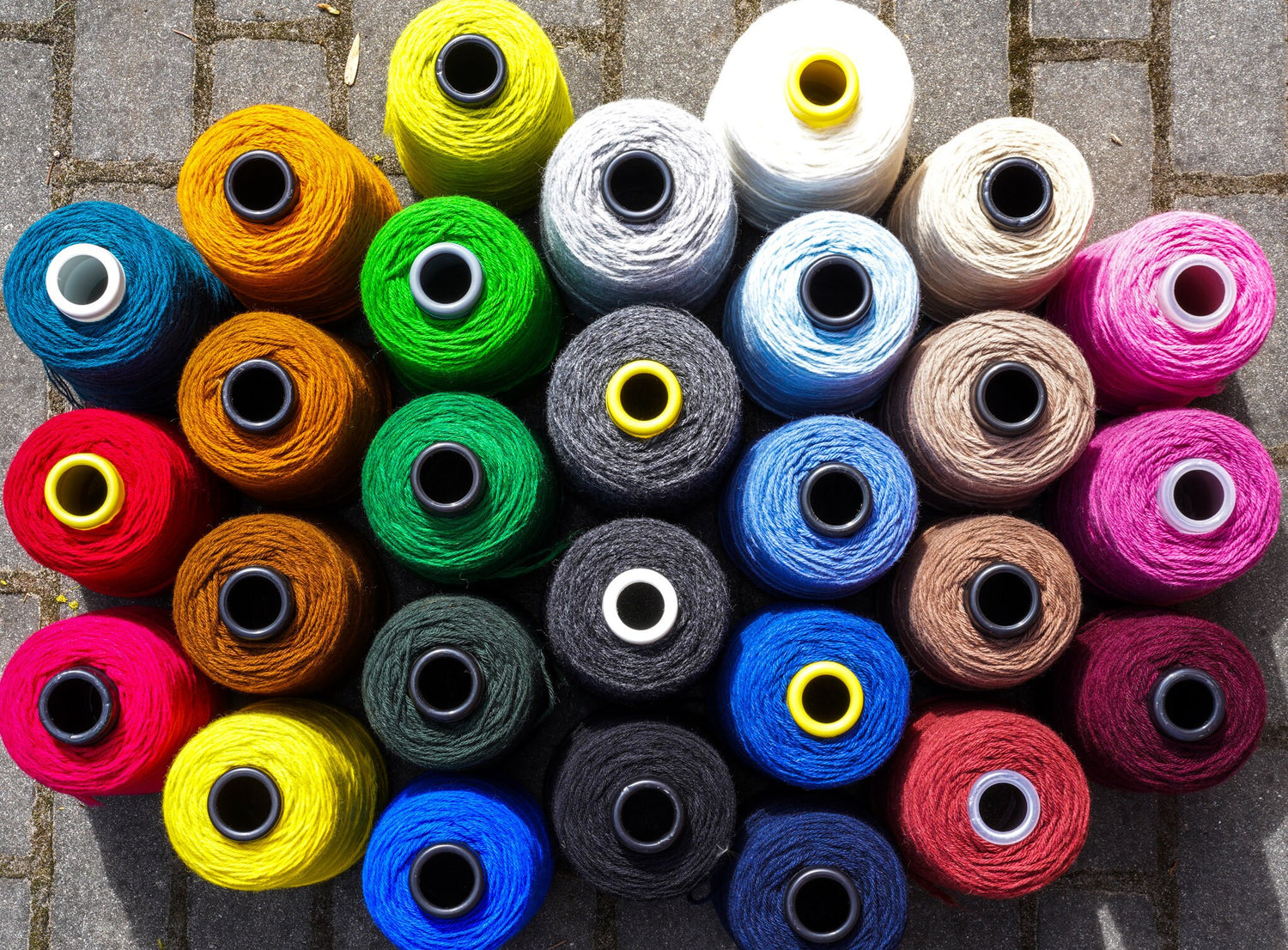 Bright rose wool yarn in a cone | bright-rose-wool-yarn-in-a-cone