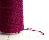 Bright rose wool yarn in a cone | bright-rose-wool-yarn-in-a-cone