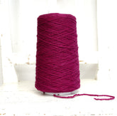 Bright rose wool yarn in a cone | bright-rose-wool-yarn-in-a-cone
