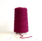 Bright rose wool yarn in a cone | bright-rose-wool-yarn-in-a-cone